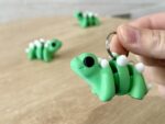 Flexi Baby Stegosaurus Keyring grass green