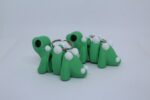 Flexi Baby Stegosaurus Keyring grass green